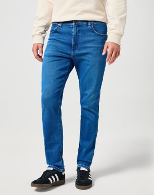 Men's stretch tapered jeans hotsell