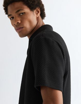 Relaxed Polo Sweater in Black