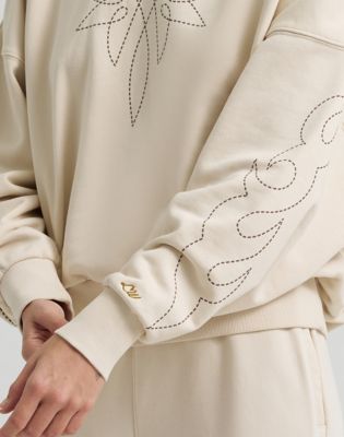 Lainey Wilson x Wrangler Cowboy Sweatshirt in Cream