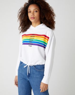 White sweater shop with rainbow